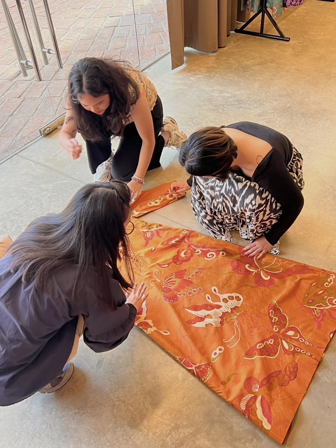 Working with a textile during a photoshoot
