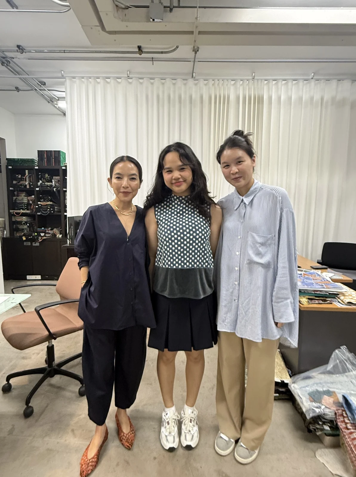 Bua with colleagues in the design studio